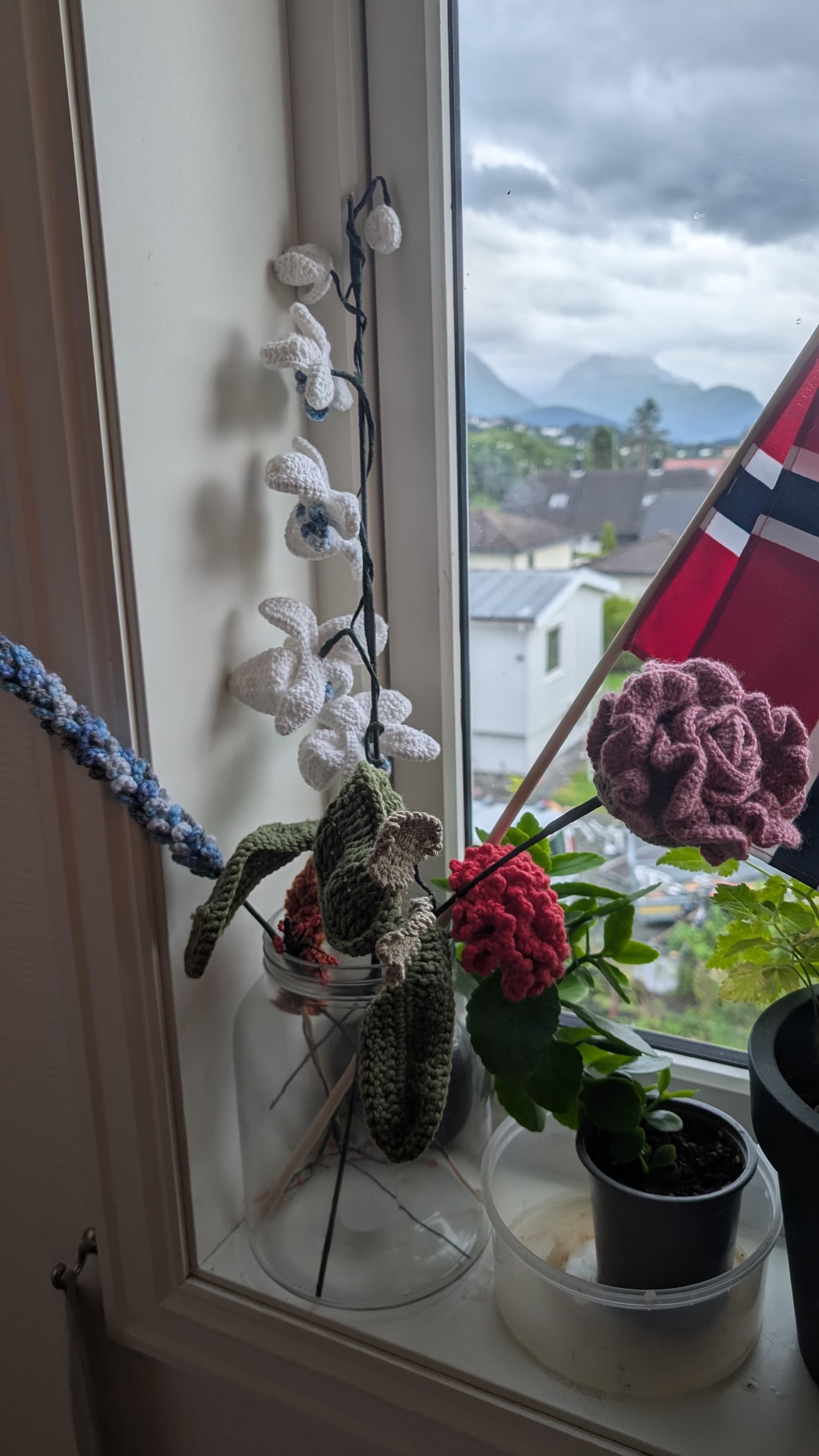 Crocheted garden arrangement by the window