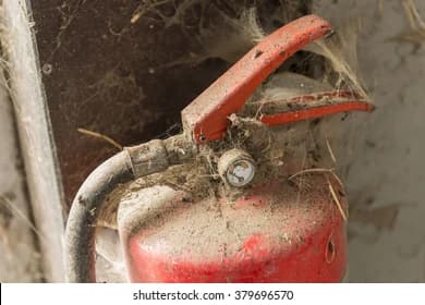 Dusty and poorly maintained fire extinguisher